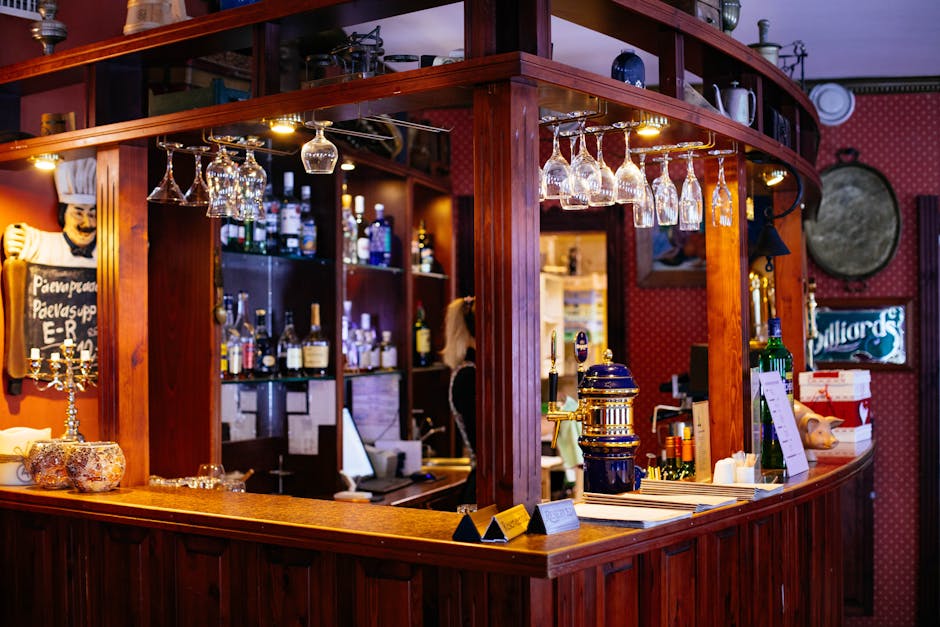 Basque pintxos variety on bar counter with wine glasses