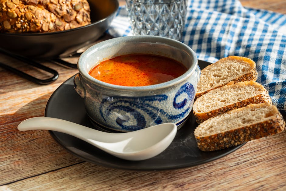 bigos stew with bread in a rustic bowl