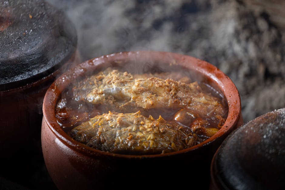 bigos stew with sauerkraut and mushrooms in clay pot