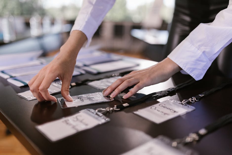 Business professionals networking at German corporate event with name badges