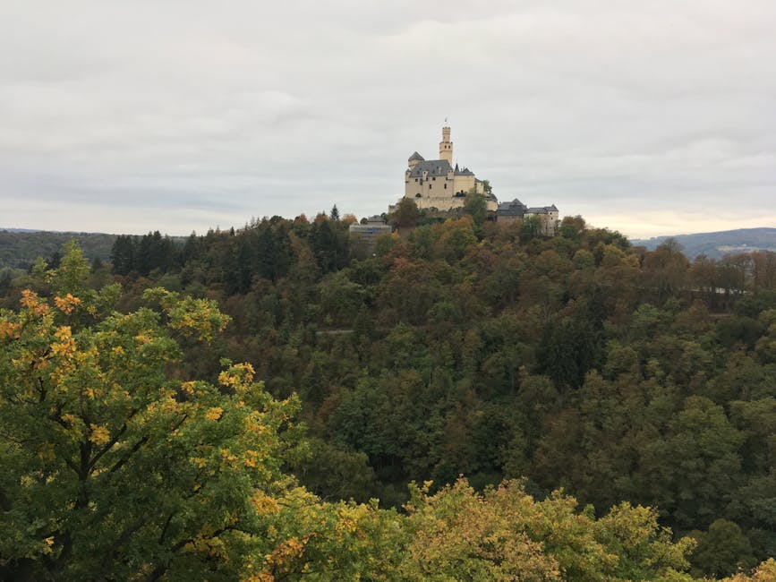 castle on hill overlooking german river valley