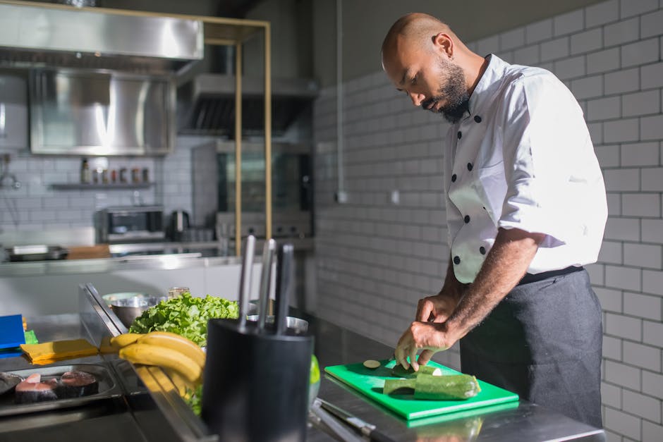 chef cooking in professional kitchen with fresh produce
