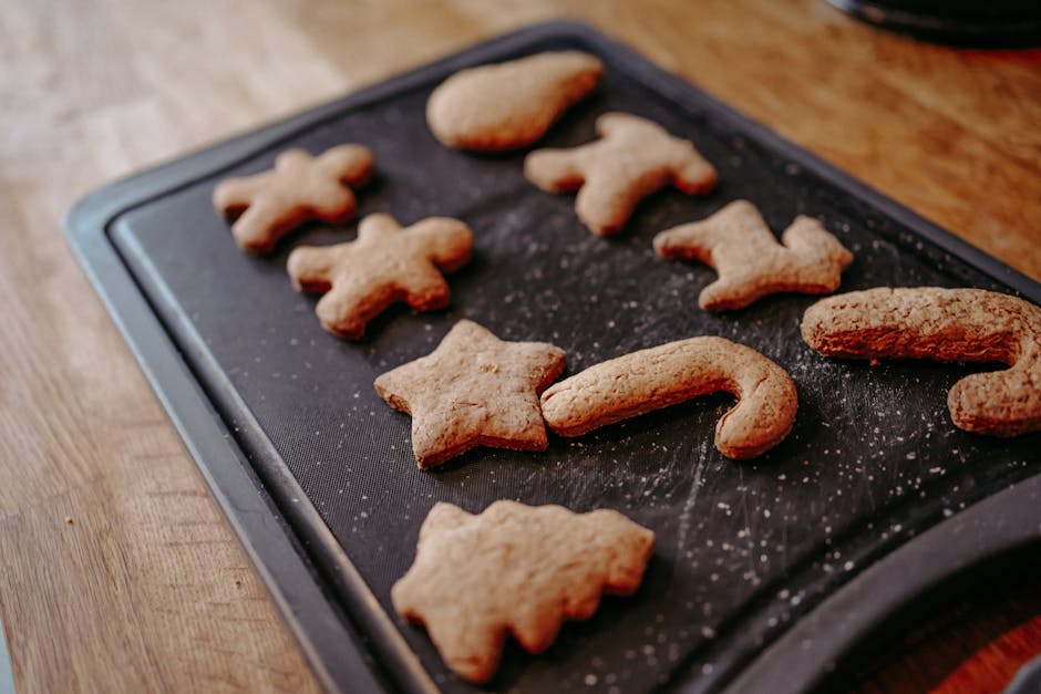 christmas cookies baking on wooden board