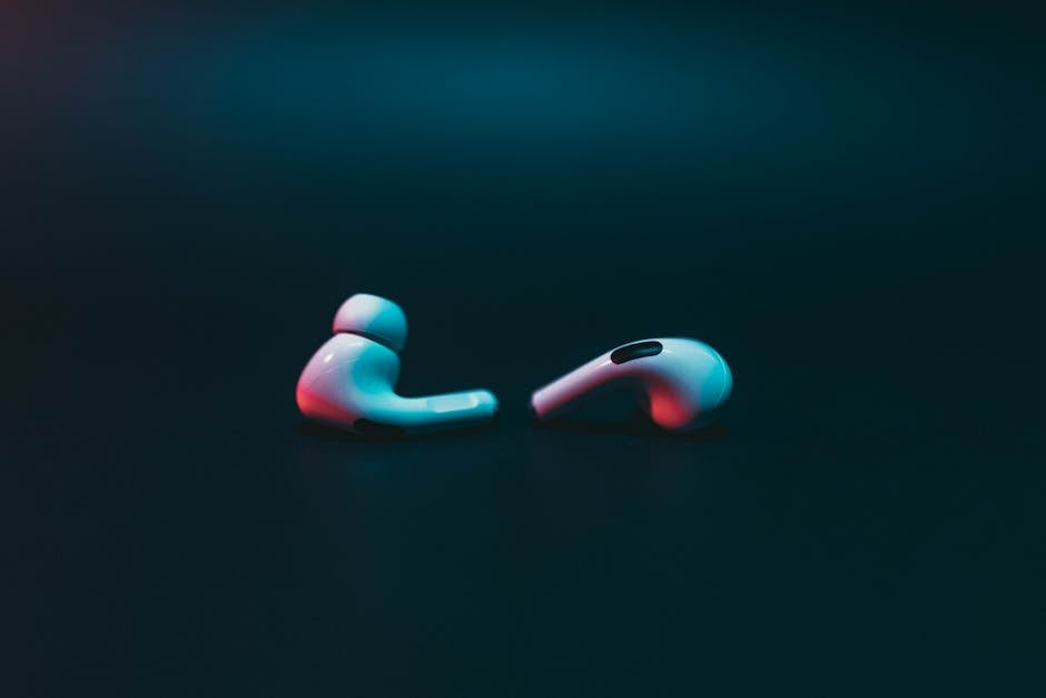 collection of colorful wireless earbuds on display