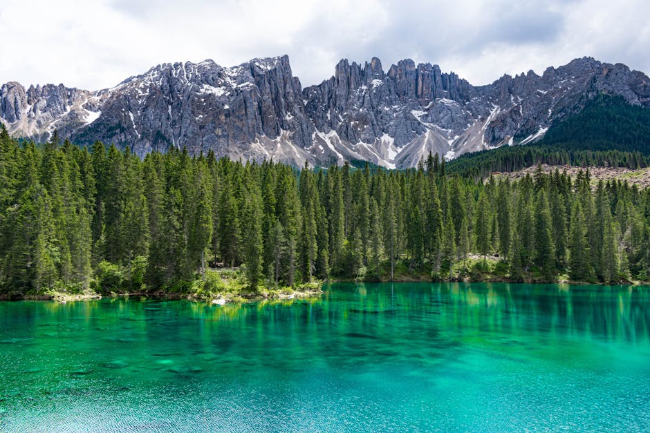colorful summer alpine lake with mountain reflection
