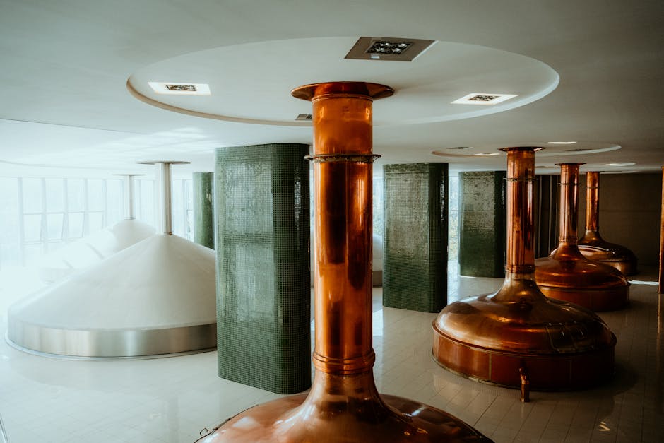 copper beer brewing tanks at craft brewery
