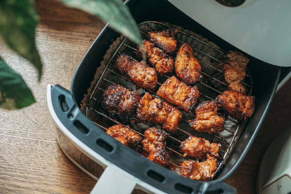 crispy chicken wings cooking in air fryer