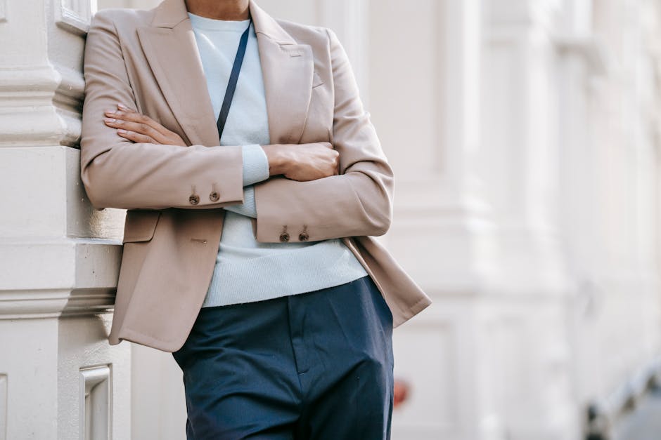elegant French woman in blazer and trousers at a Parisian office