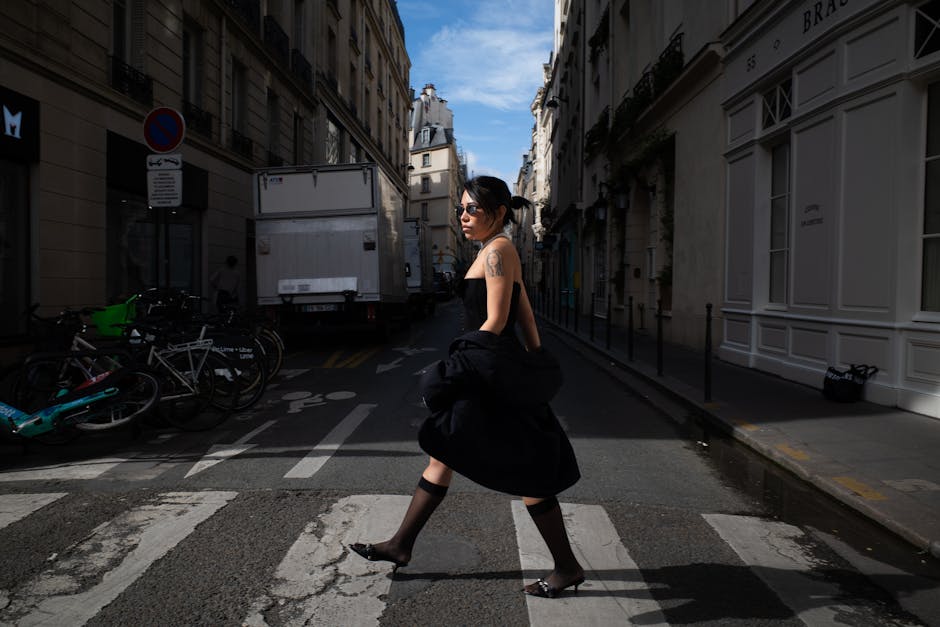 Elegant Parisian woman walking city
