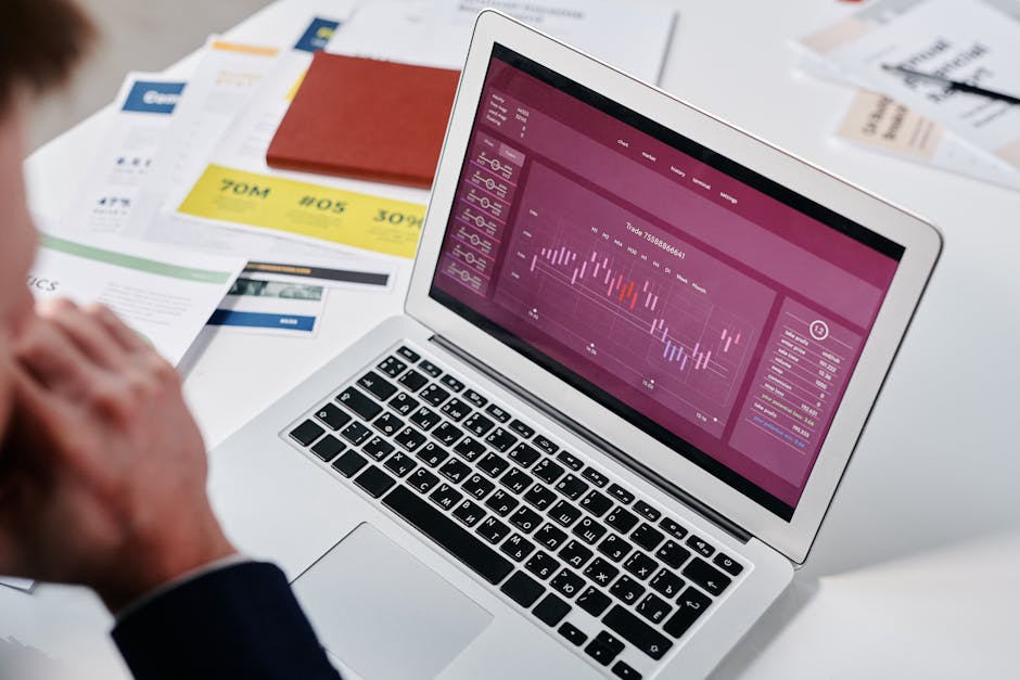 entrepreneur reviewing positive  data on laptop screen