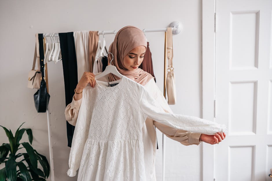 for modest fashion in Polish clothing store rack of midi dresses