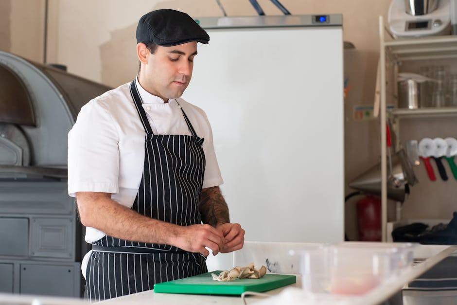 French chef preparing cassoulet in professional kitchen