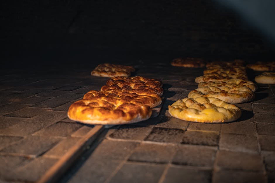 Fresh socca flatbread from oven