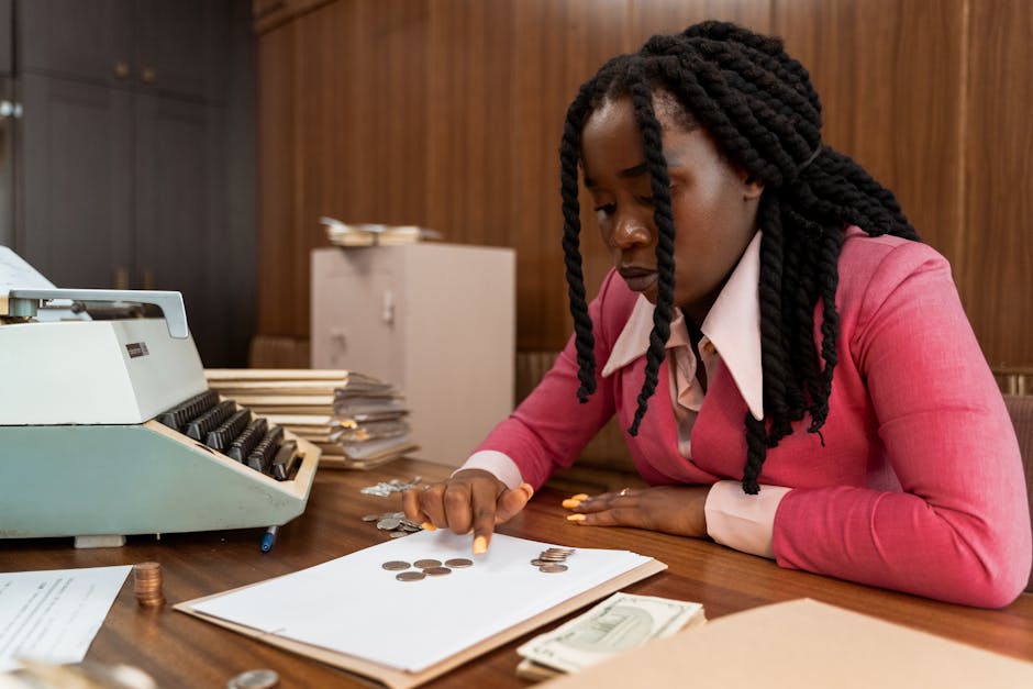 German accountant working at desk with papers
