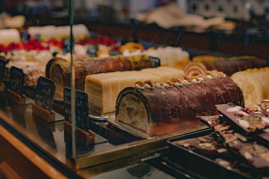 German bakery display with assorted pastries and cakes