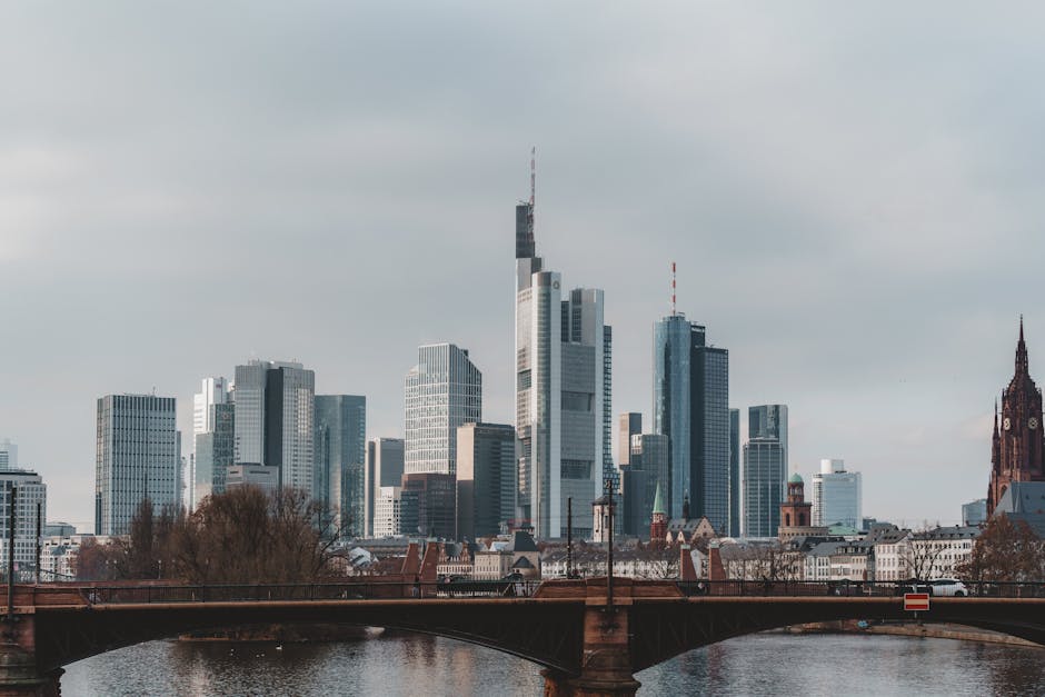 German city skyline with business district towers at golden hour