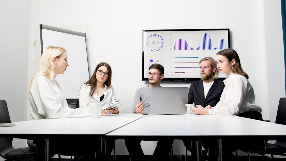 German IT team meeting collaboration in conference room