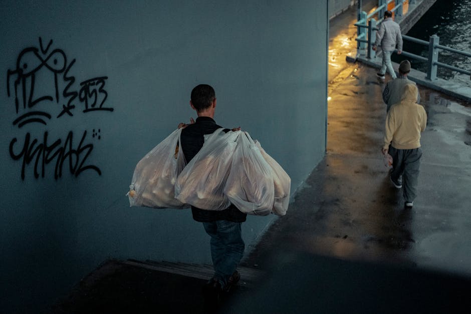 german  street with people carrying bags
