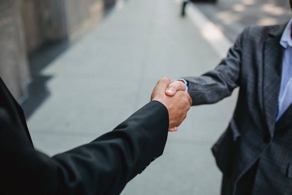 handshake partnership meeting german city