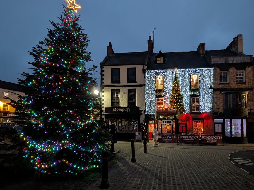 illuminated historic town square with christmas decorations