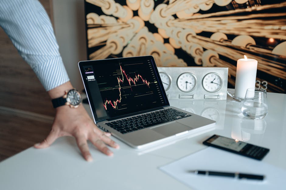 Investor analyzing business data on laptop in Paris