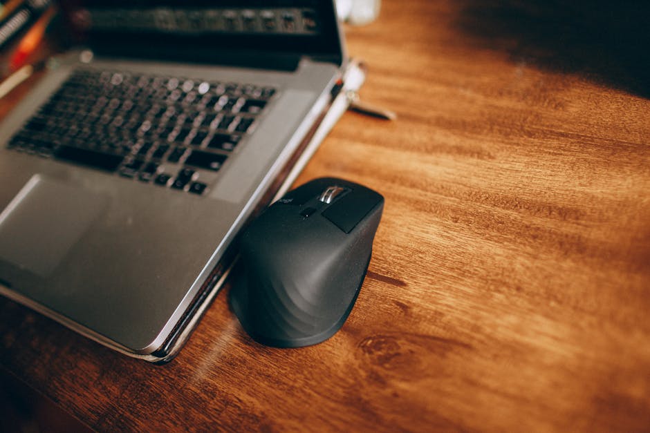 laptop computer on wooden desk