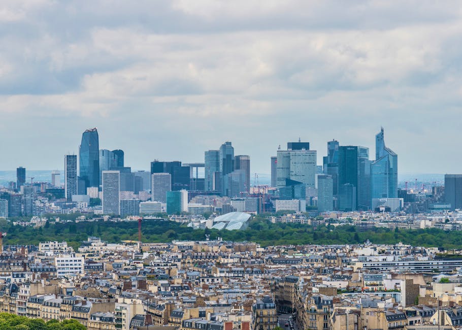 Paris business district evening skyline with Eiffel Tower