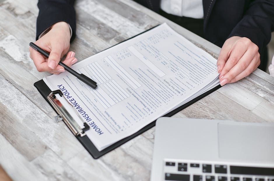 person analyzing privacy policy documents with laptop