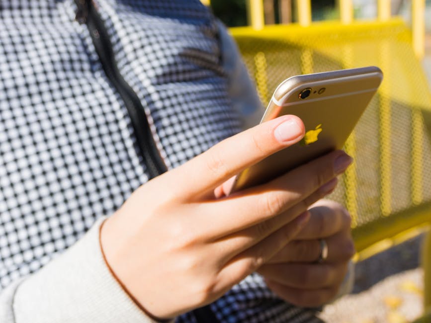 person checking smartphone condition