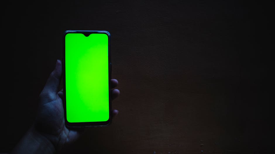 person holding modern smartphone with screen lit