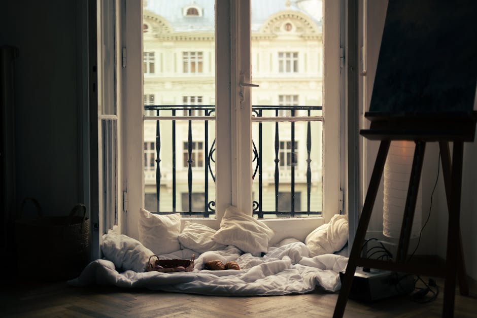 person relaxing in bright french city apartment