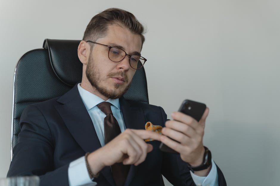 person using smartphone for business management