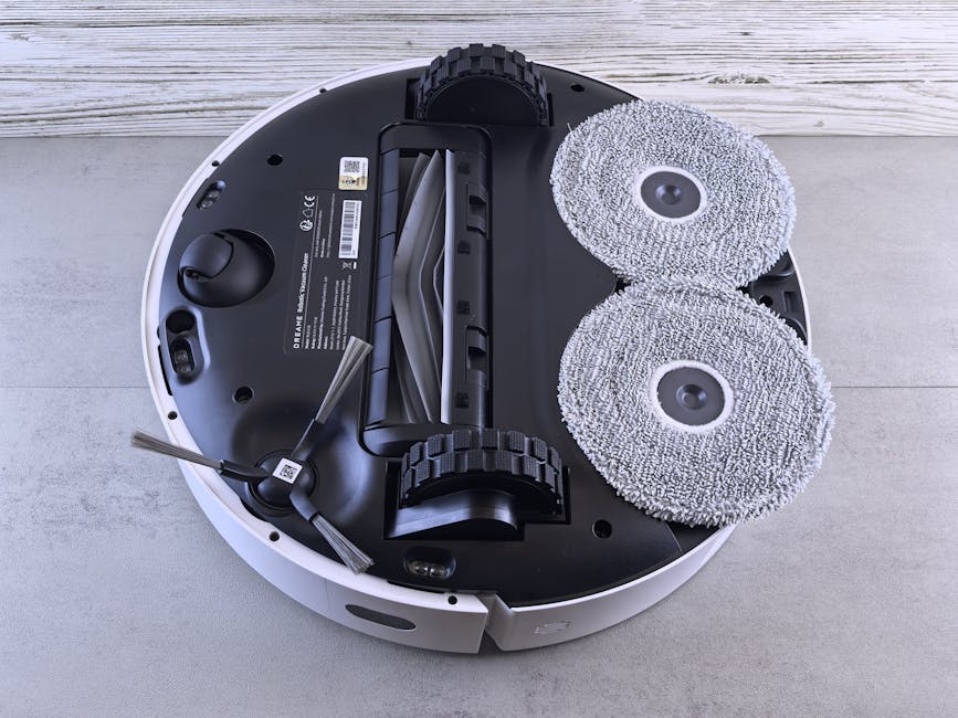 robot vacuum nozzle brushing dust from tile floor grout lines