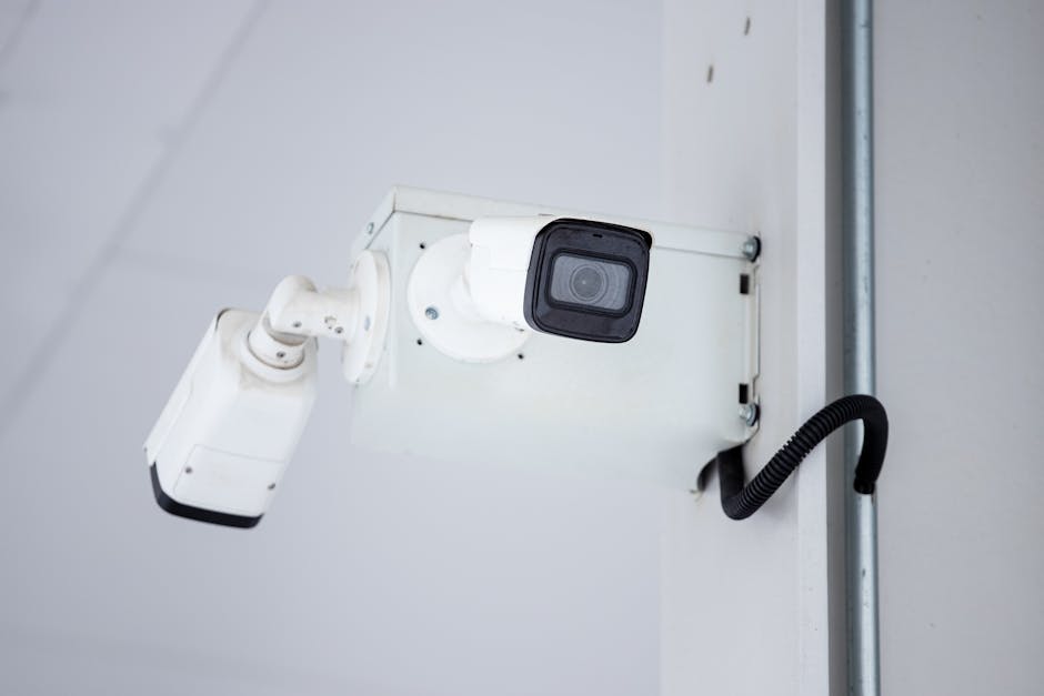 security camera mounted in modern apartment entryway