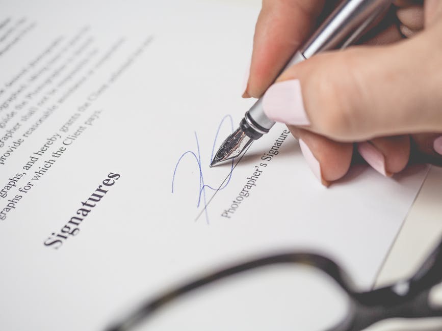 signing business documents at polish office