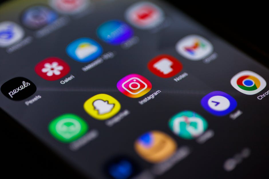 smartphone display with colorful apps on table