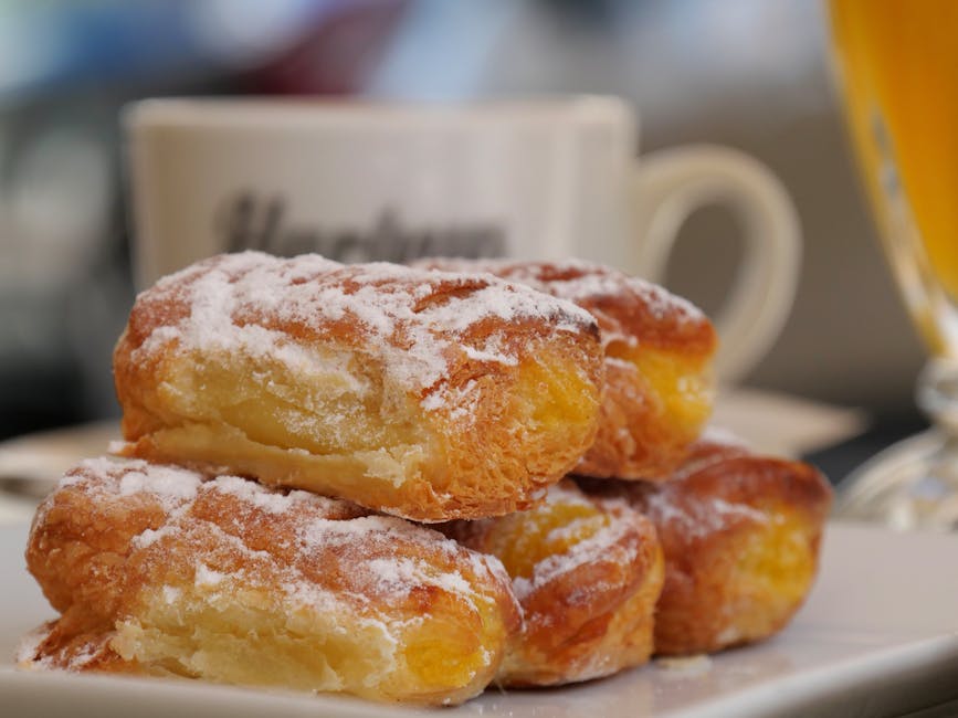 Spanish café con leche and pastries on a bar counter