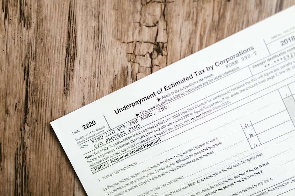 spanish tax forms and official documents on wooden table