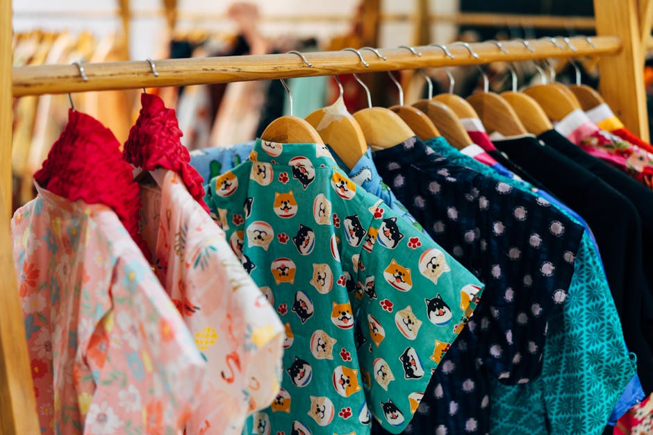 stylish summer dress on wooden hanger display