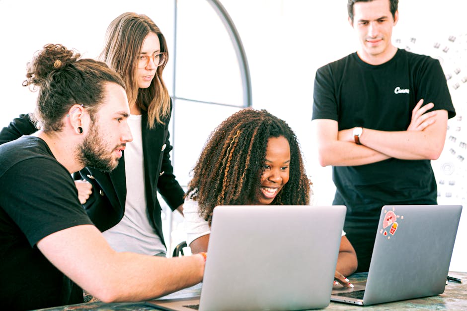 tech professionals working together in startup office