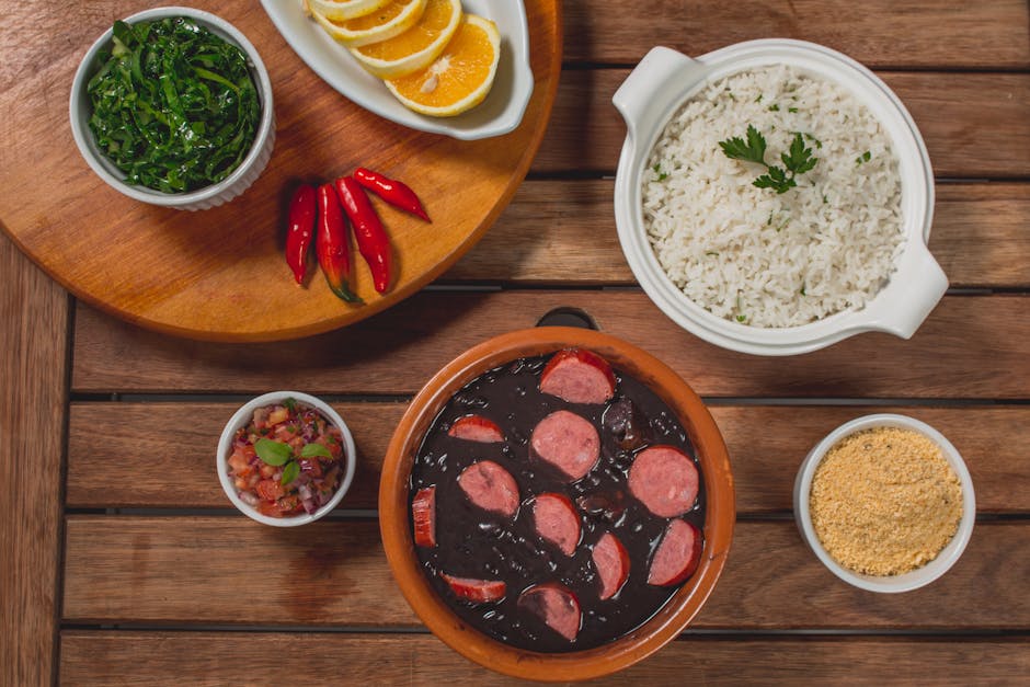 traditional Brazilian feijoada served with rice and farofa