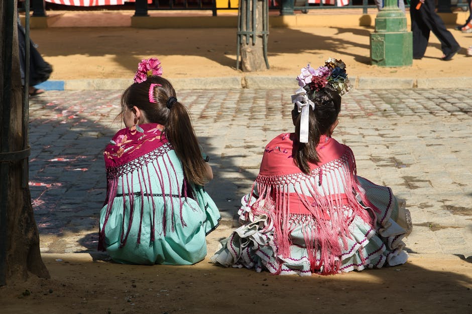 women in colorful flamenco dresses at Seville Fair